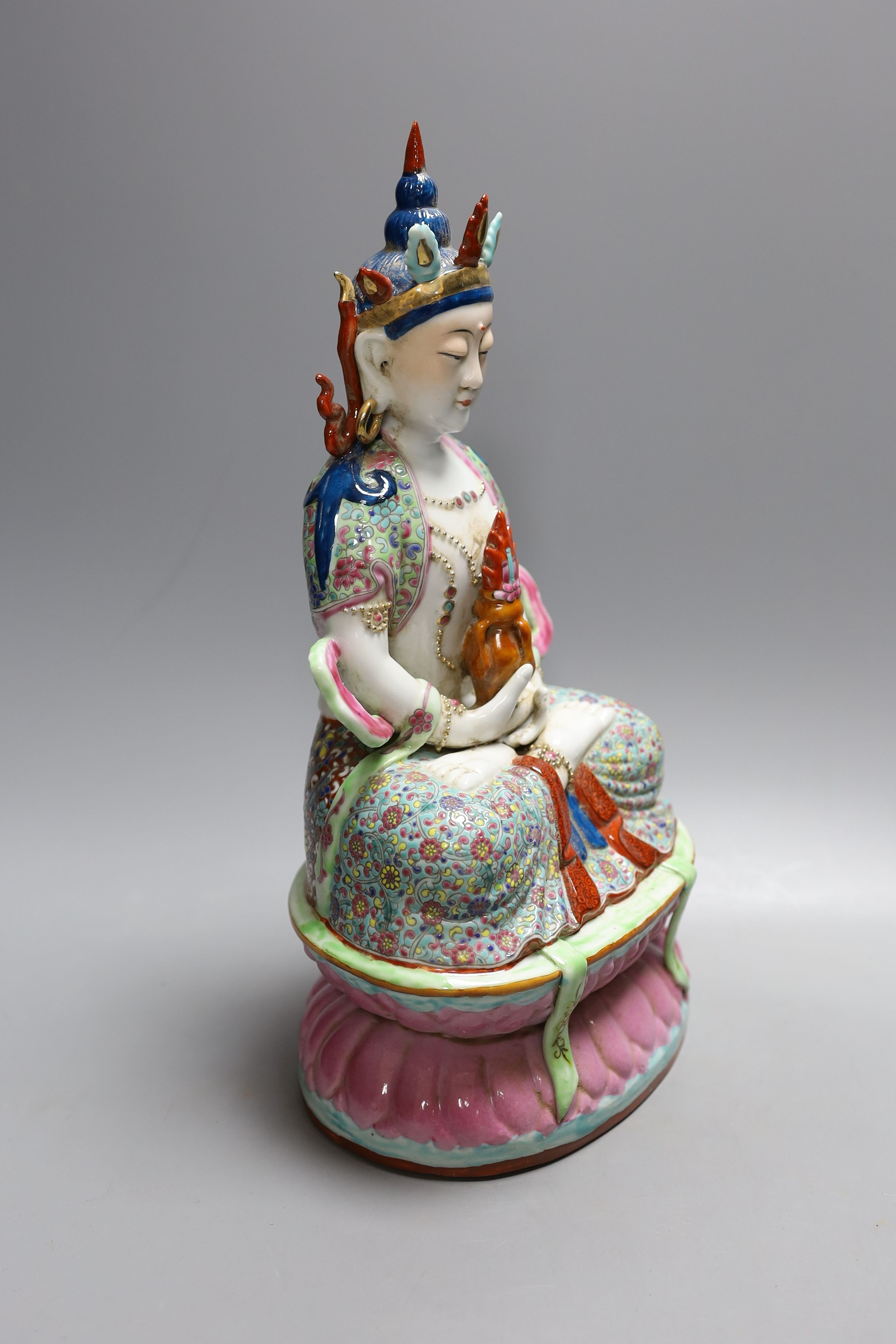 A Chinese famille rose seated of Amitayus, marked to base - 33cm tall